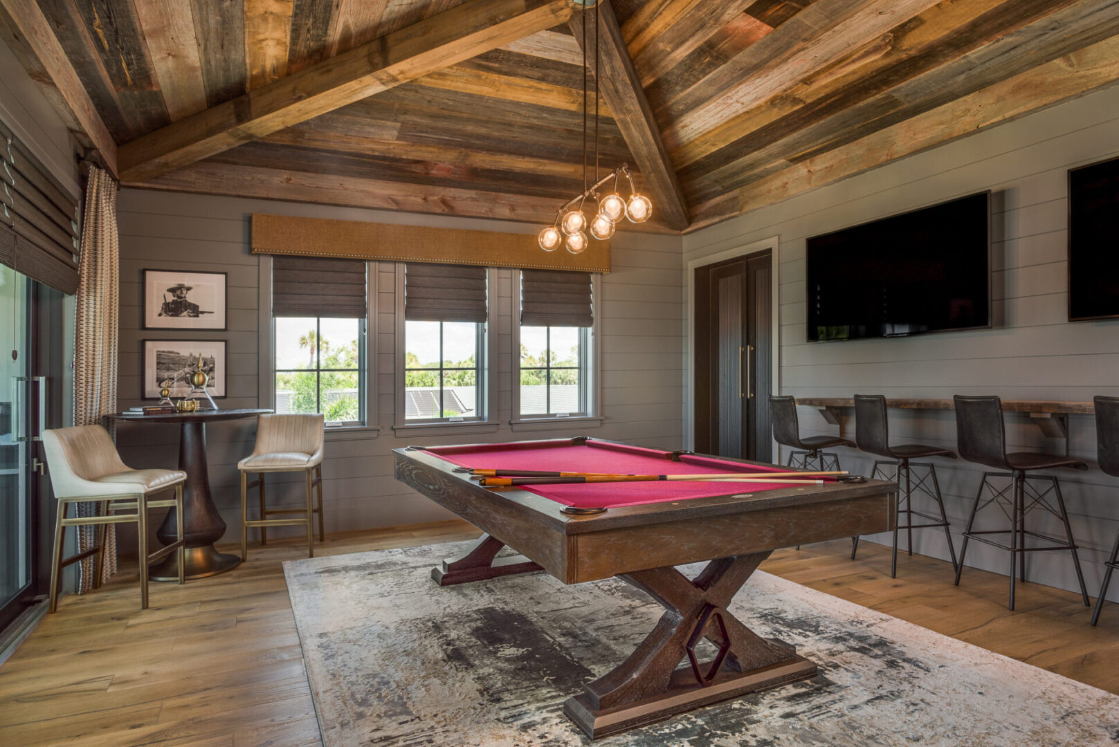 A Billiards Area With High Wooden Beams