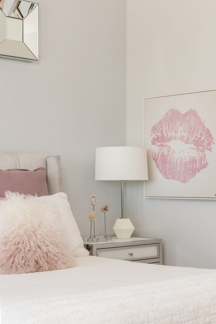A White and Pink Color Themed Bedroom With Image