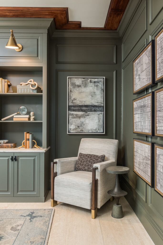 A chair and some shelves in a room.