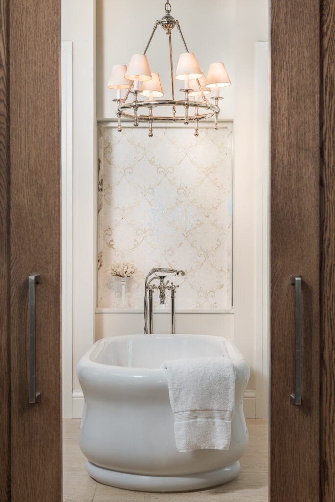 A bathroom with wooden cabinets and white fixtures.